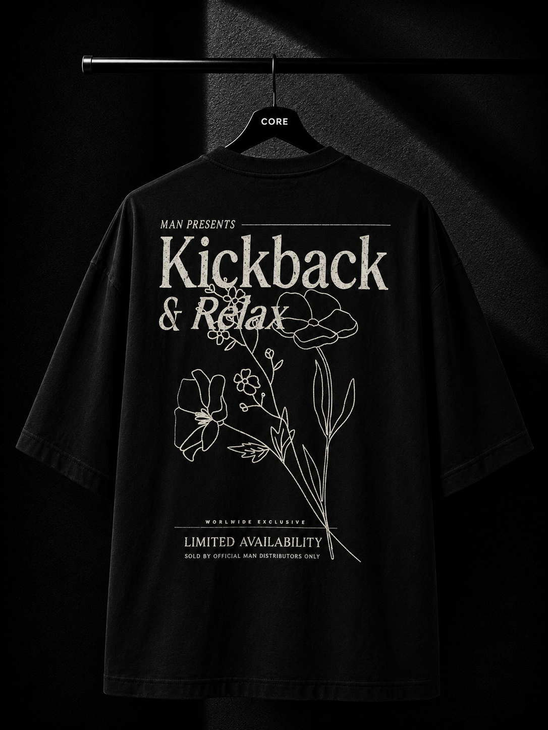 Black oversized streetwear T-shirt with a minimalist white maple leaf graphic cascading from the shoulder on a premium studio mockup.