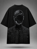 Black oversized graphic T-shirt featuring a surreal faceless figure with cosmic textures and philosophical typography in a monochrome back print.