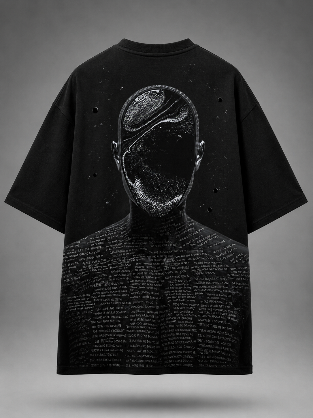 Black oversized graphic T-shirt featuring a surreal faceless figure with cosmic textures and philosophical typography in a monochrome back print.